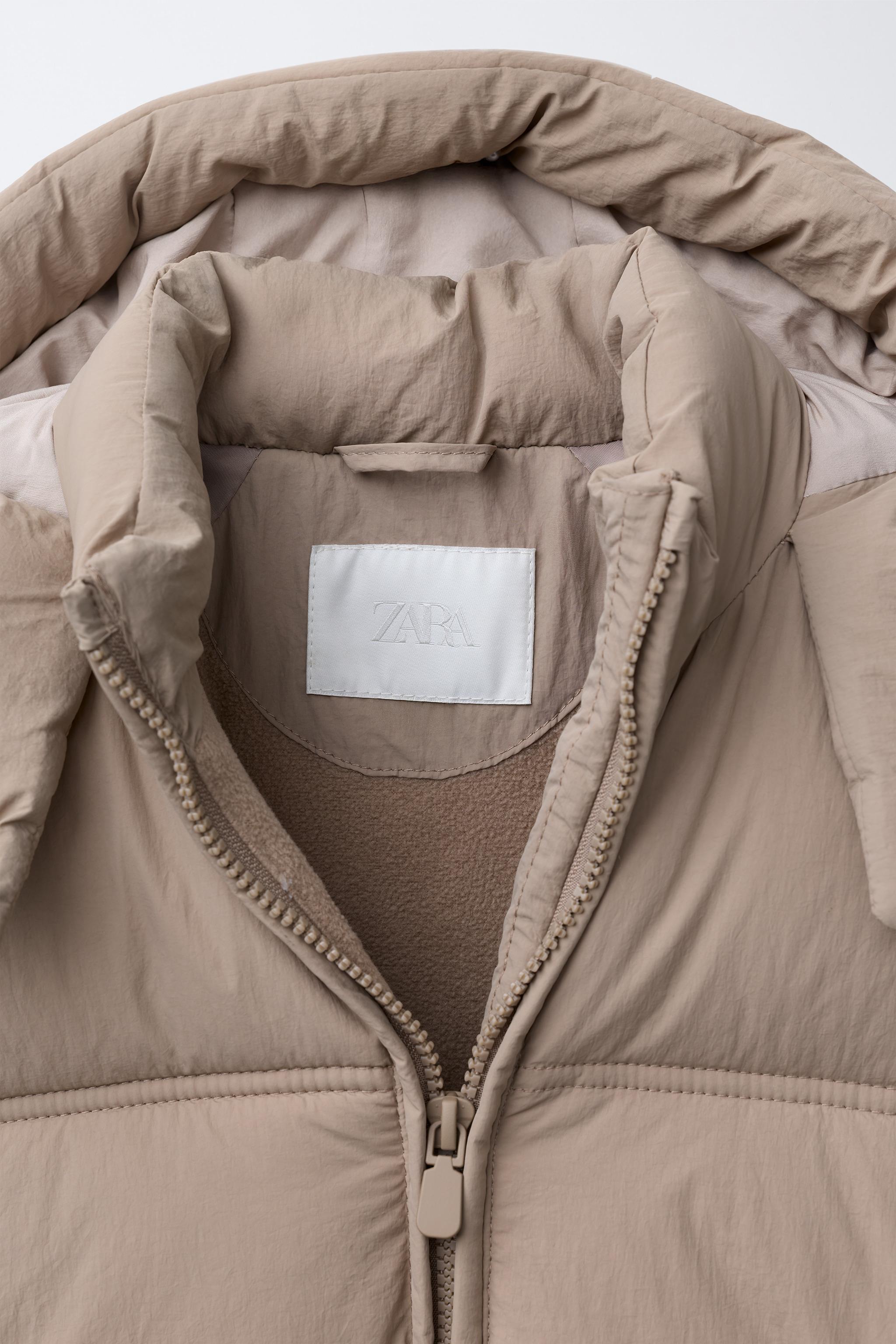 MANTEAU MATELASSÉ À CAPUCHE DÉPERLANT